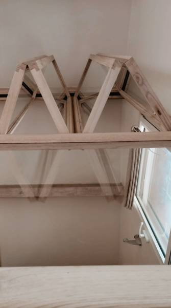 Réalisation d’une verrière en châtaignier à vantaux pliants pour mezzanine sur mesure à Genève